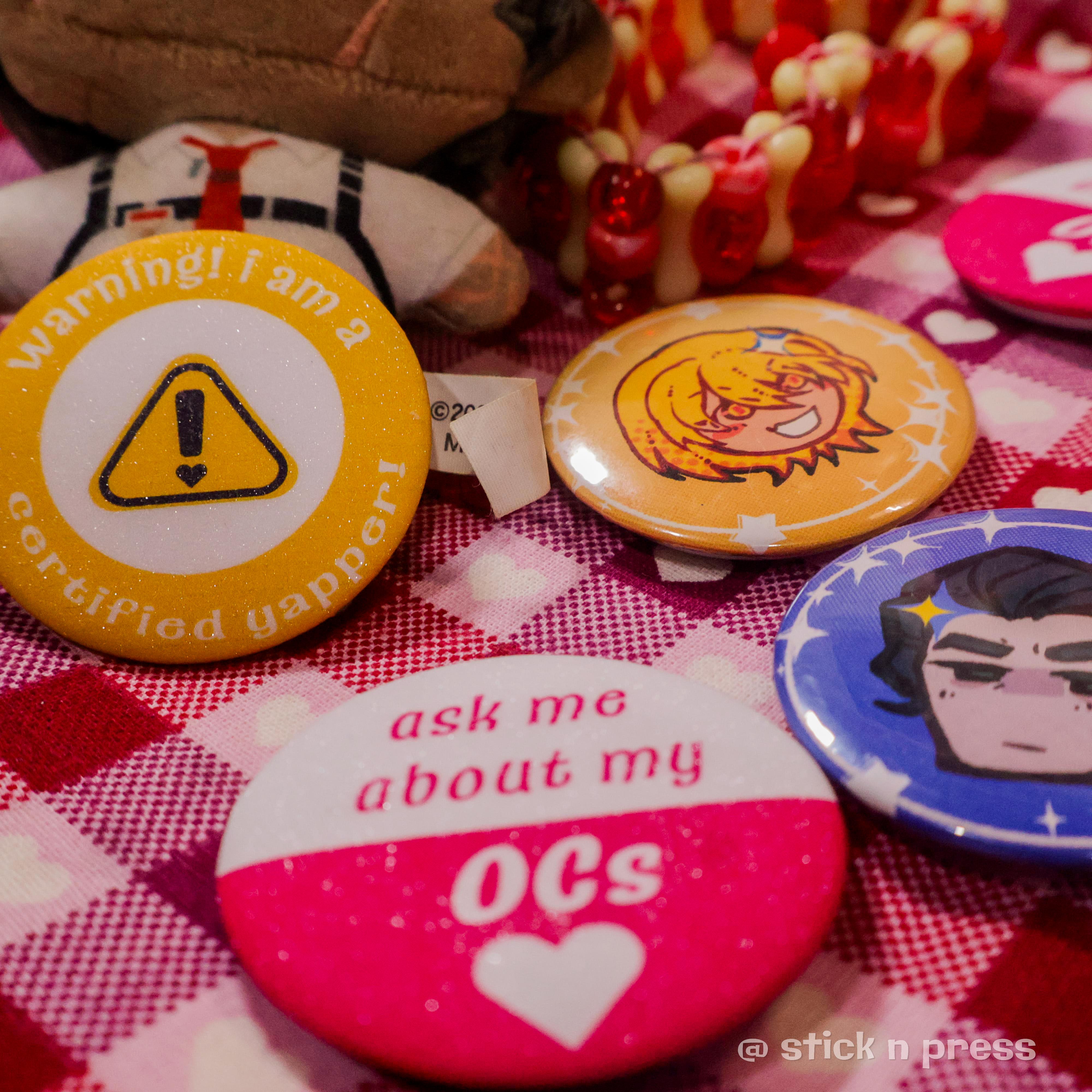 Button pin merchandise displayed together