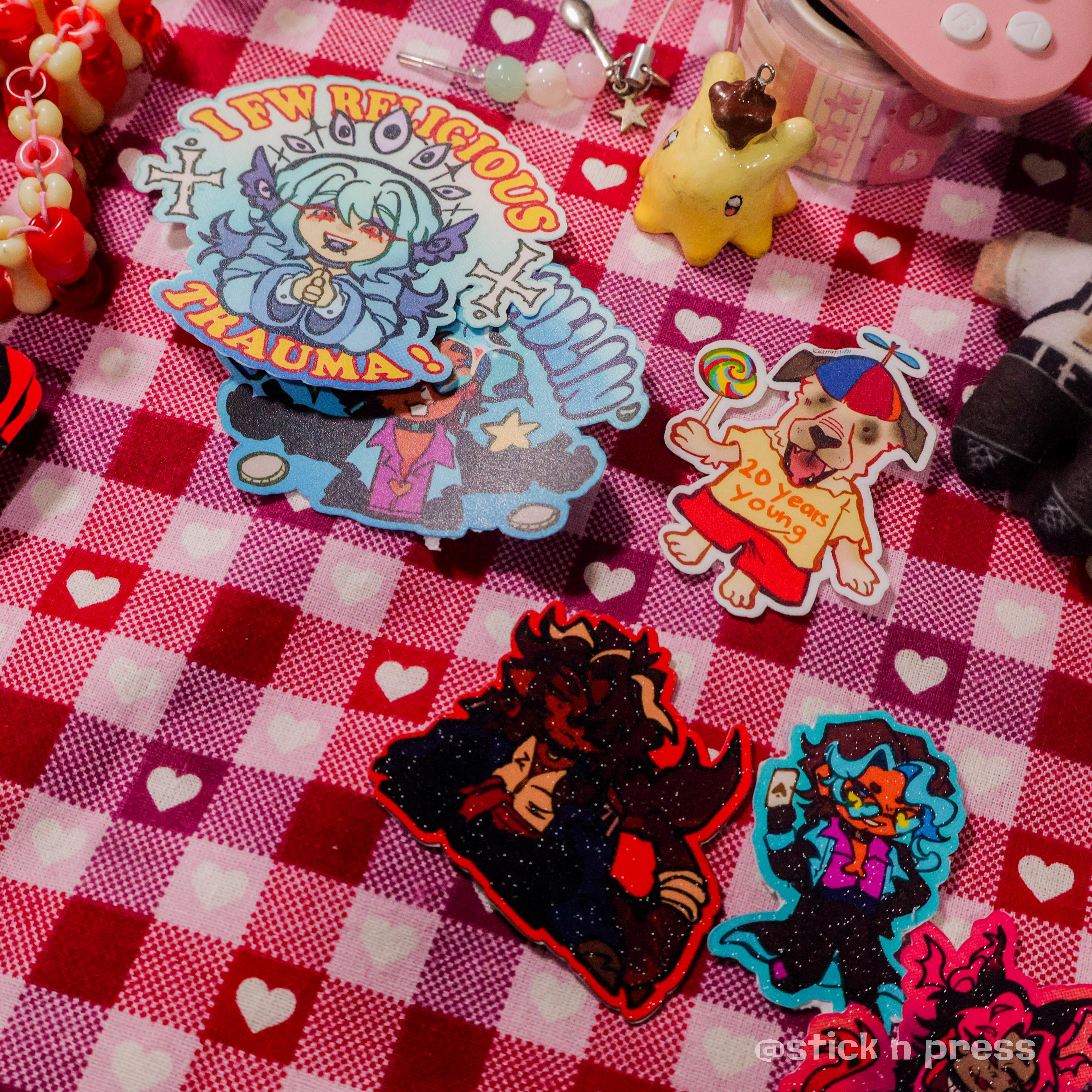 Sticker merchandise samples on a checkered display