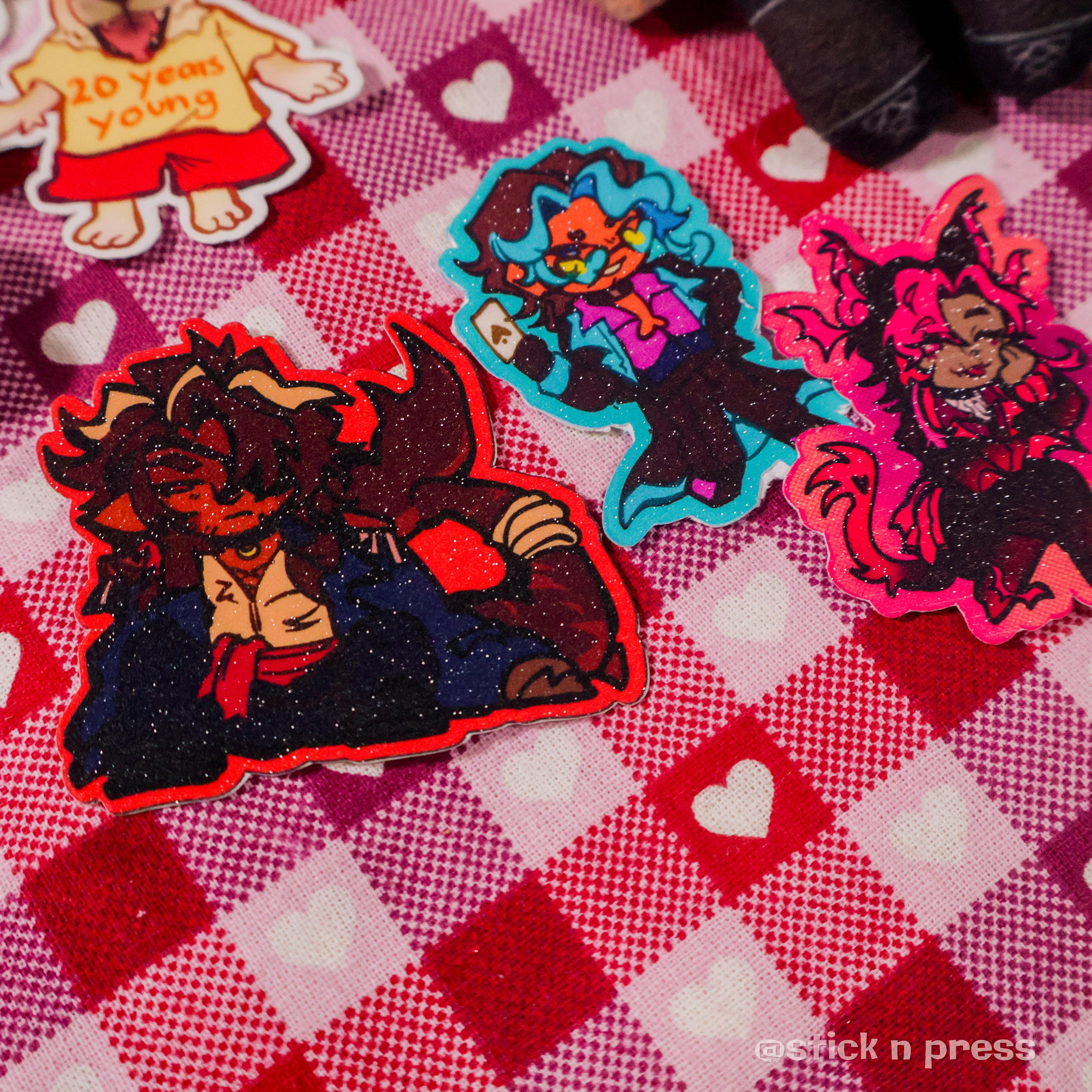 Glitter sticker examples on a table