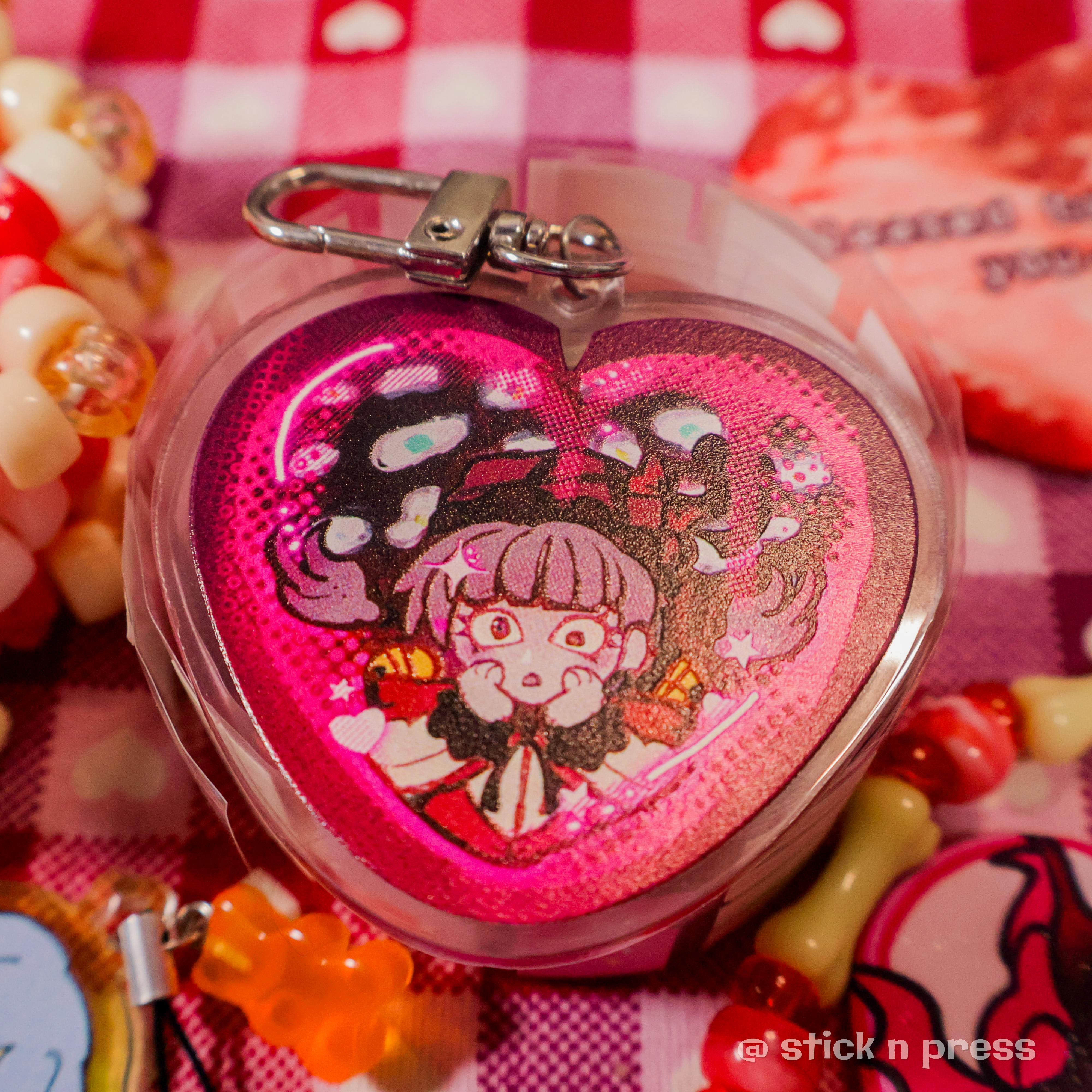 Acrylic keychain sample displayed on a table